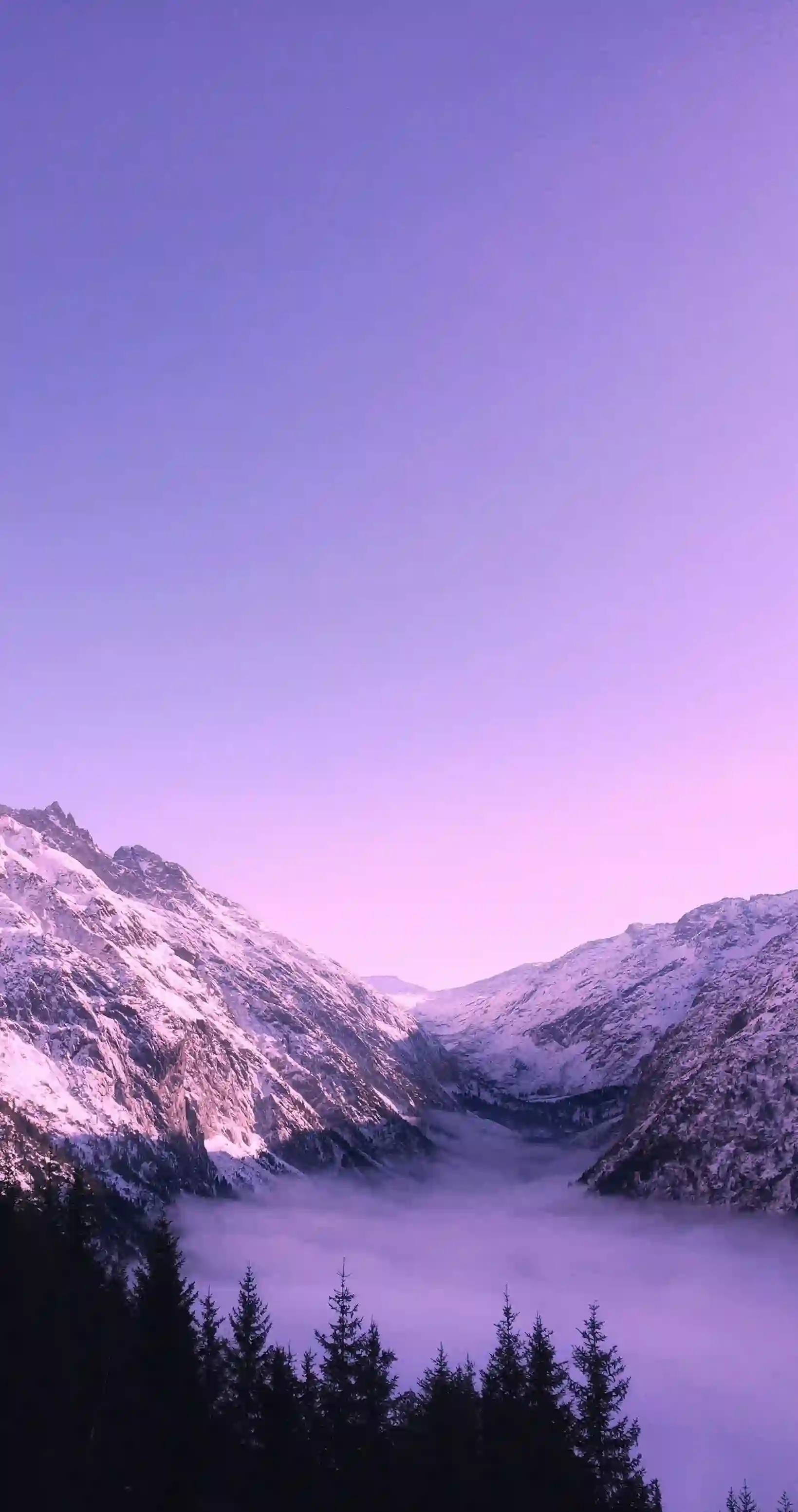 A mountain range with a big blue sky.